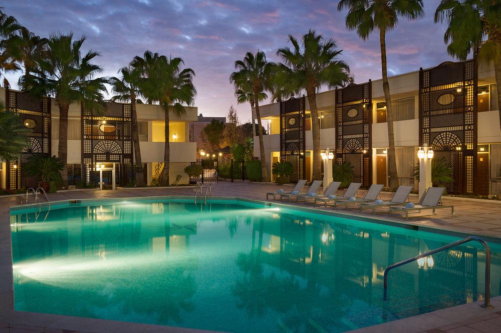 Amman Marriott Hotel Exterior photo The pool at the Royal Palm